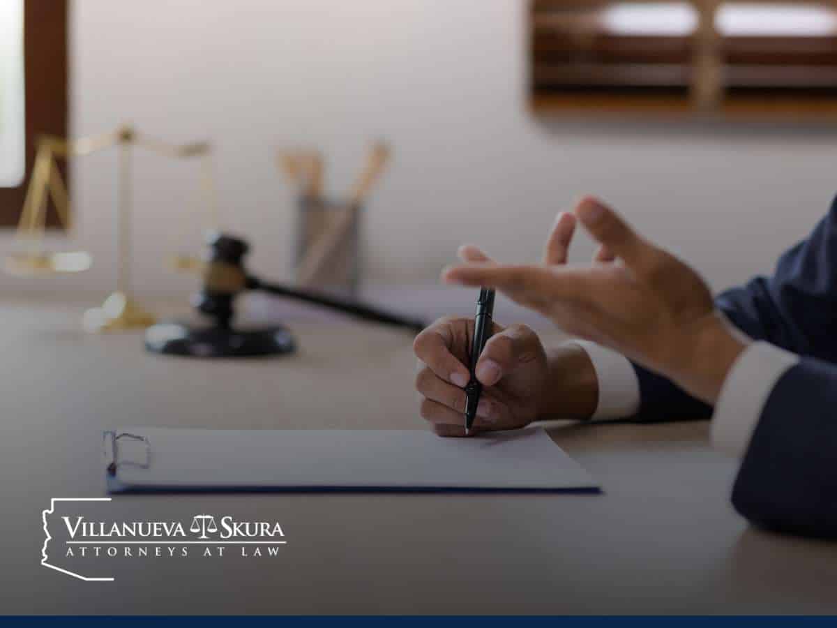 Attorney discussing legal strategy during the [Pre-Charge Stage] of a case, with legal scales and gavel in the background